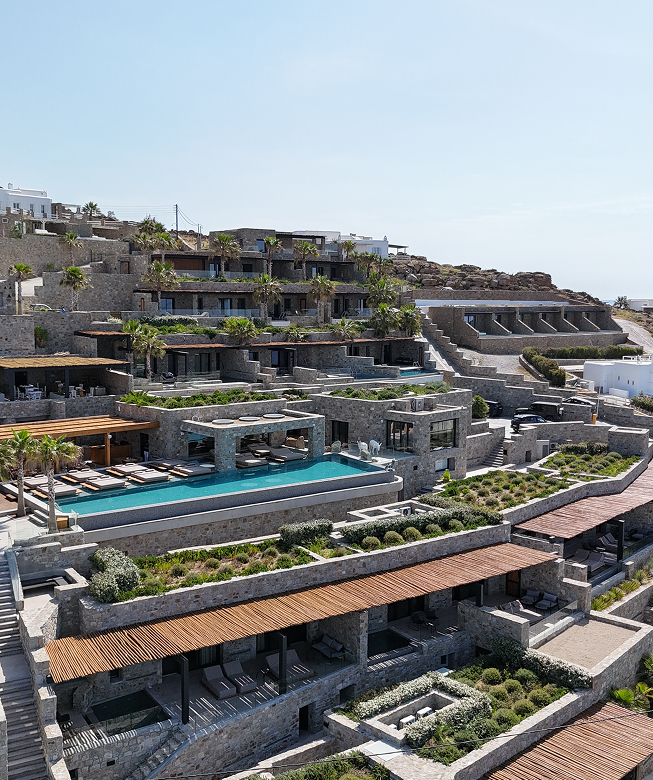Tropicana Suites & Villas with infinity pools and natural stone design overlooking the Aegean