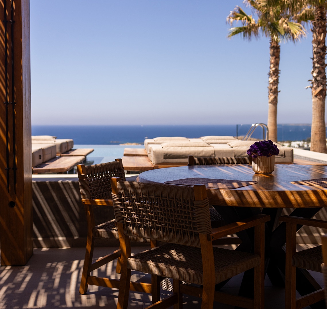 Table with pool & sea view at Tropicana's Comus restaurant